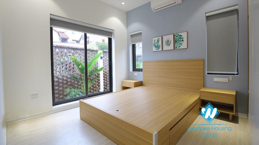 House for rent with four bedrooms and yard around the house in An Duong Vuong, Tay Ho